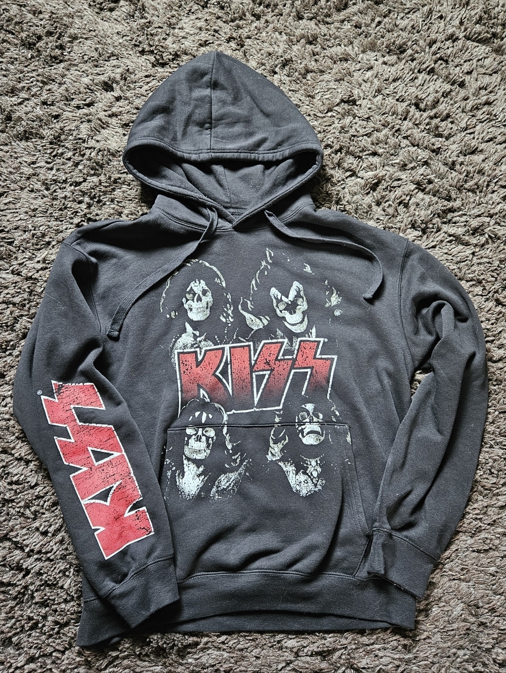 KISS pullover hoodie. Size medium Black fabric with bold red KISS logo and red s